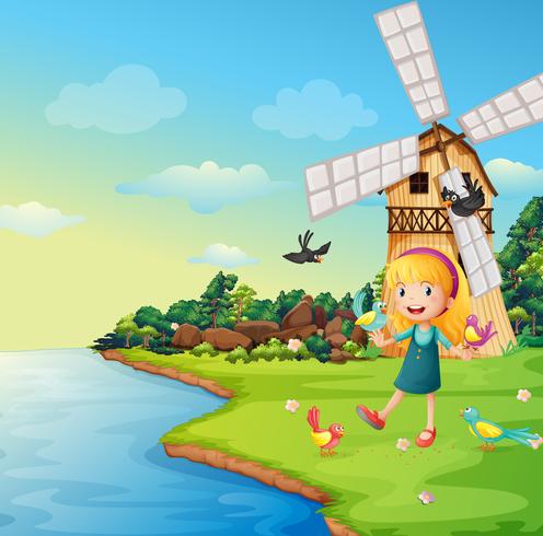 A girl playing with her birds near the barnhouse with windmill vector