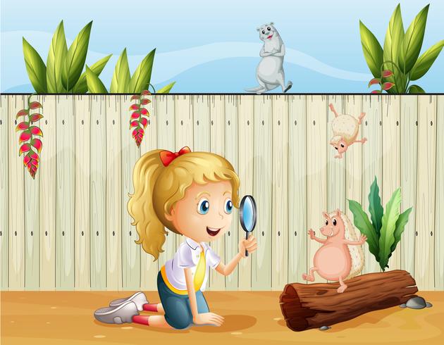 Wild animals and a girl with a magnifying glass vector