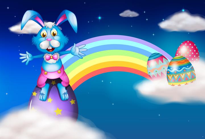 An easter bunny and eggs near the rainbow vector