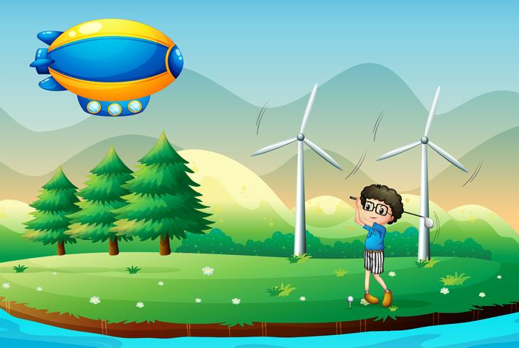 Un niño jugando al golf en el campo con molinos de viento. vector