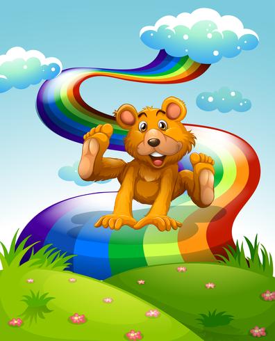 Un juguetón oso pardo saltando cerca del arco iris. vector