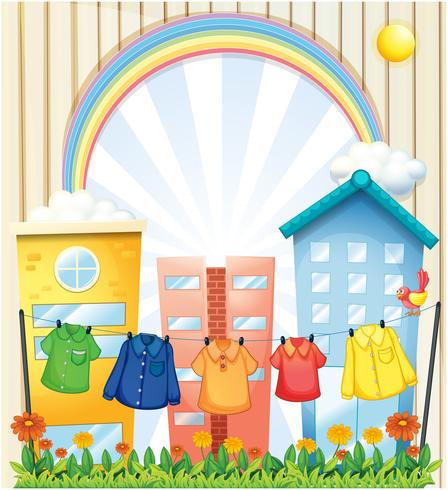 Hanging clothes at the garden near the tall buildings vector