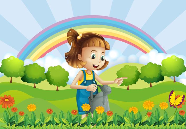 A young girl holding a sprinkler in the garden vector