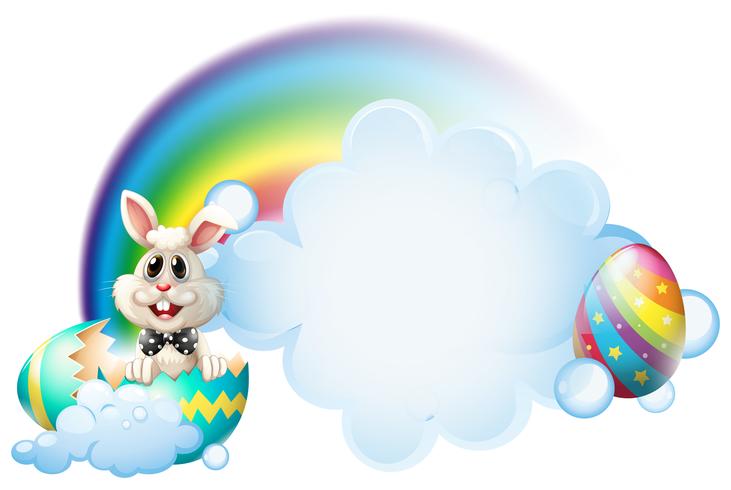 A cracked egg with a bunny near the rainbow vector