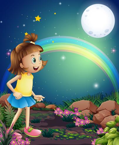 Un niño asombrado por la vista del arco iris y la luna llena. vector