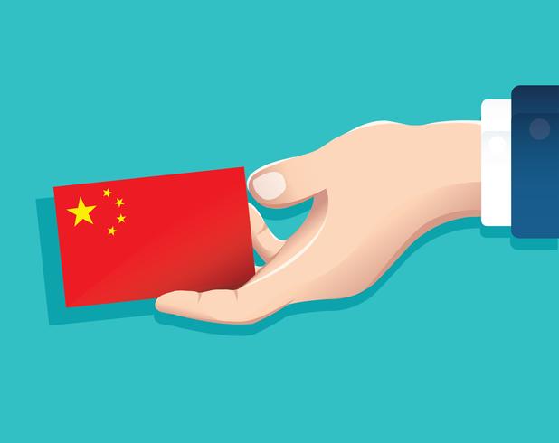 mano que sostiene la tarjeta de la bandera de china con fondo azul vector