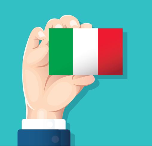 Mano que sostiene la tarjeta de la bandera de Italia con fondo azul. vector