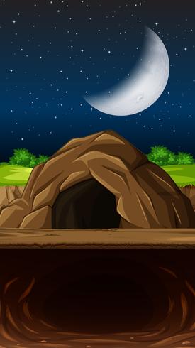 Una cueva en la noche vector