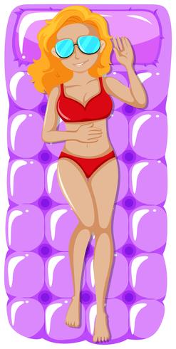 Woman in red bikini on purple raft vector