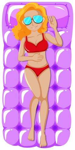 Mujer en bikini rojo en balsa púrpura vector