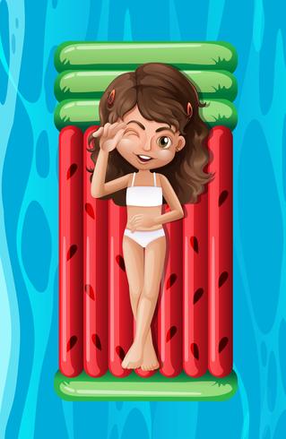 Young girl relaxing on a pool float vector