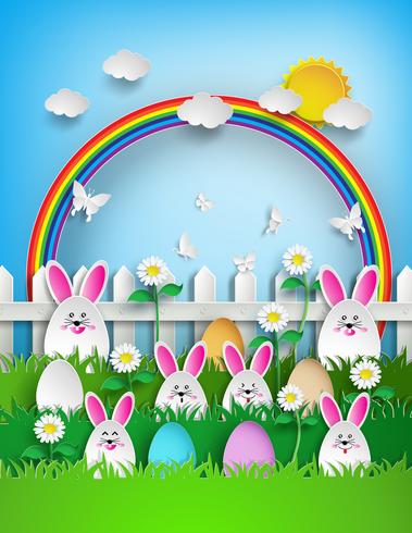Fondo de Pascua con huevos y conejo en hierba con arco iris vector