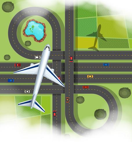 Aerial scene with airplane flying over the roads vector