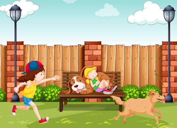 Girls playing with dogs in park vector