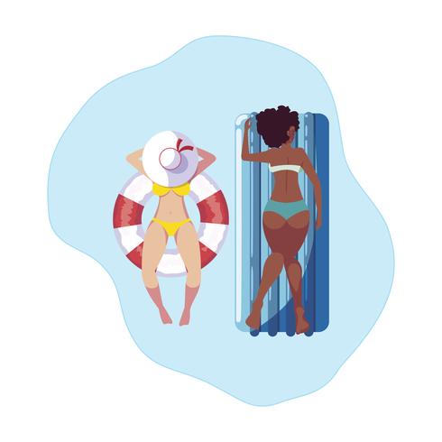 Chicas interraciales con traje de baño y salvavidas flotan en el agua. vector