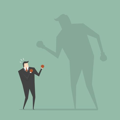 Businessman Fighting His Shadow vector