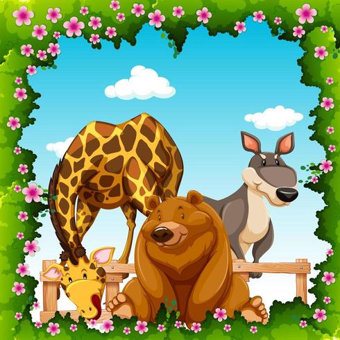 Wild animals in flower frame vector