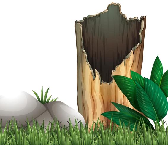 Wooden log and rock on grassland vector