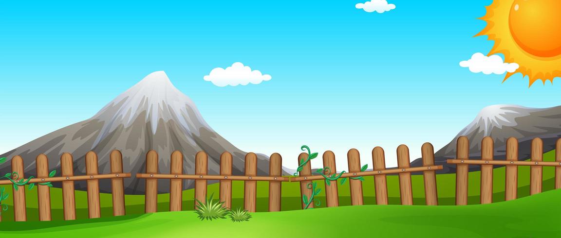 Scene with mountains and fields with fence vector