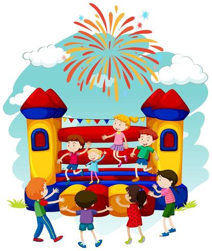 Children jumping on bouncing castle vector