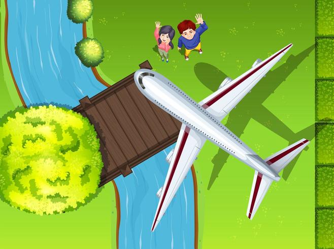 Aerial view of airplane flying over the park vector