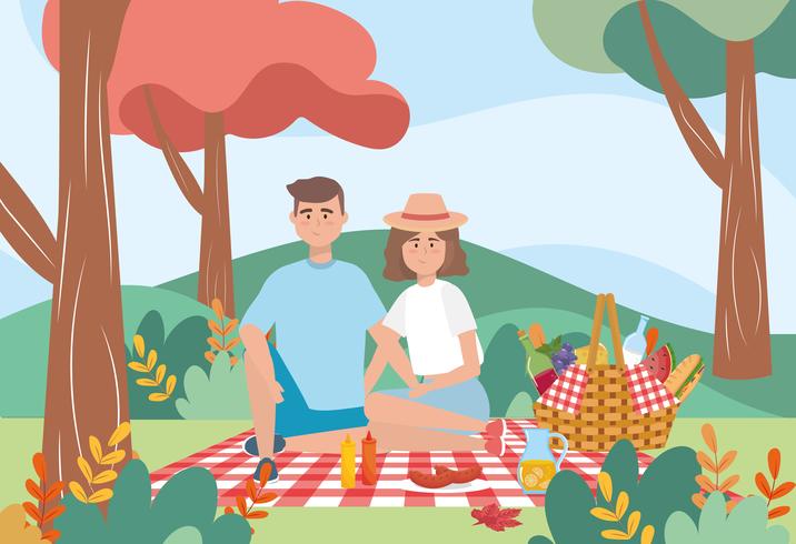 Hombre y mujer haciendo un picnic vector