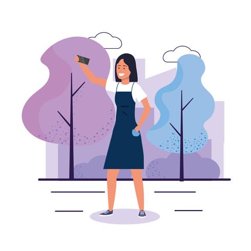 Young woman with smartphone taking selfie in park  vector