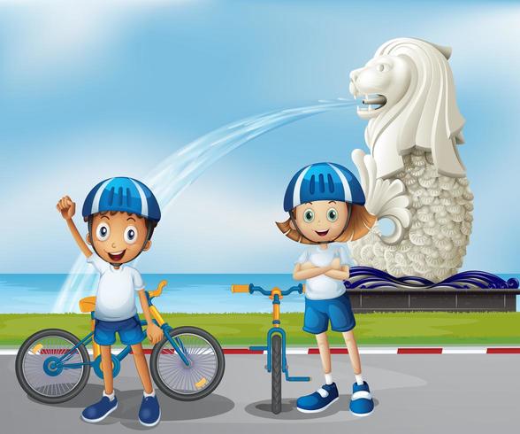 Two cute bikers standing in the front of the Merlion vector