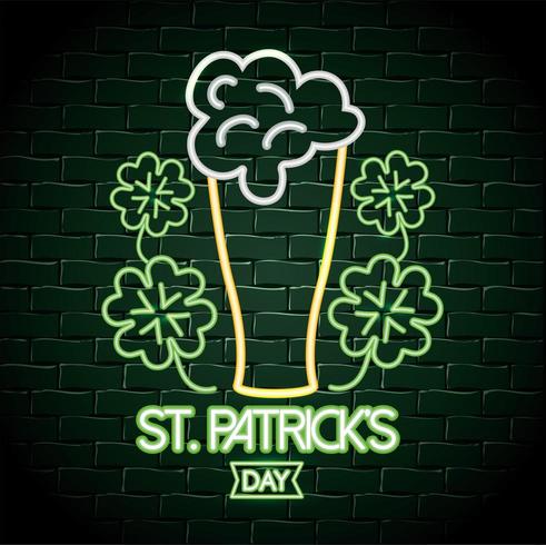 beer glass with clovers neon label to celebration vector