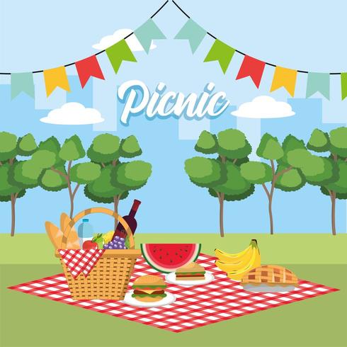 basket with healthy fruits in the tablecloth and party flags vector