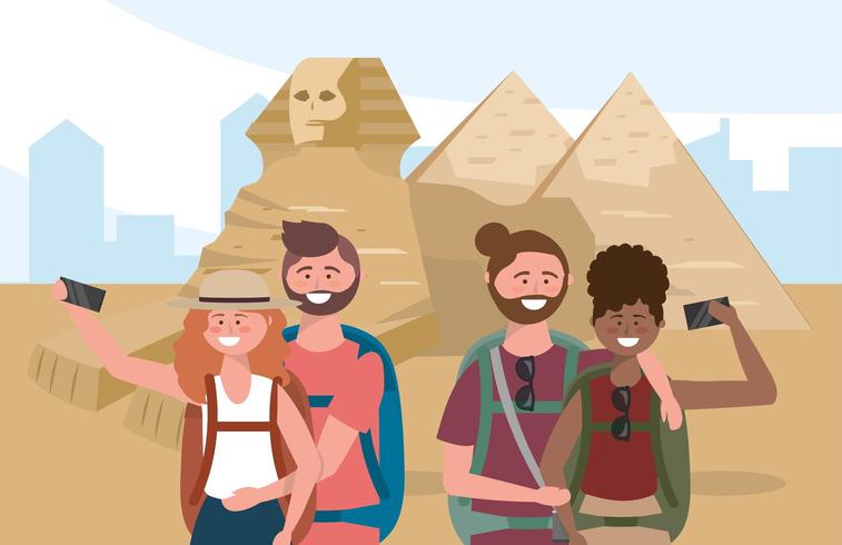couples taking a picture with backpack in the egypt sculpture vector