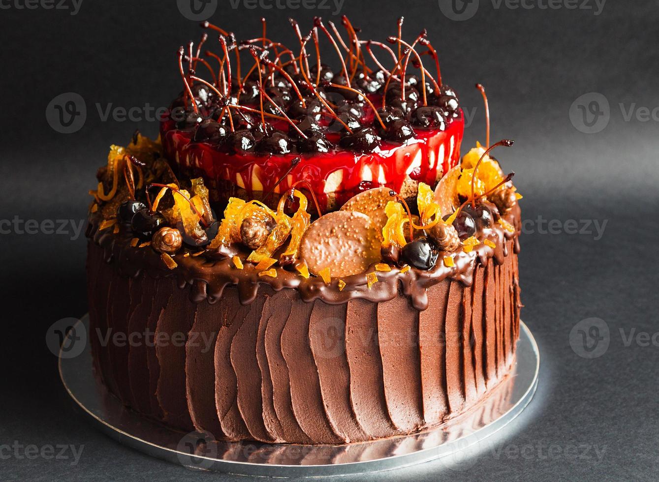 Rustic chocolate cake with fruit photo