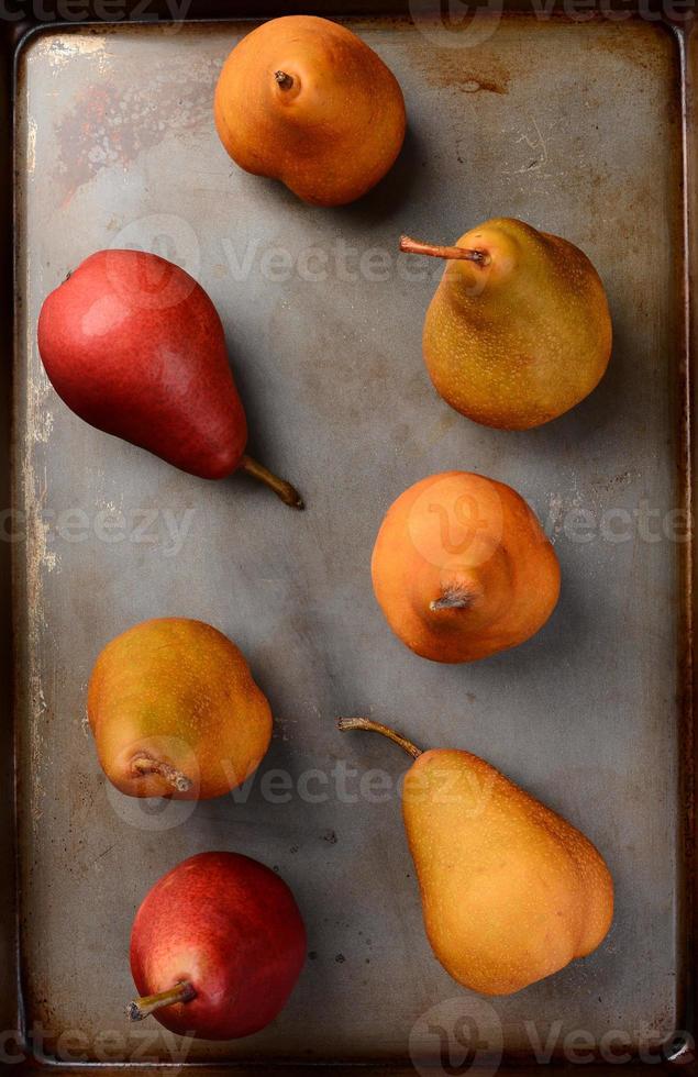 Bosc and Red Pears on Baking Sheet 704709 Stock Photo at Vecteezy