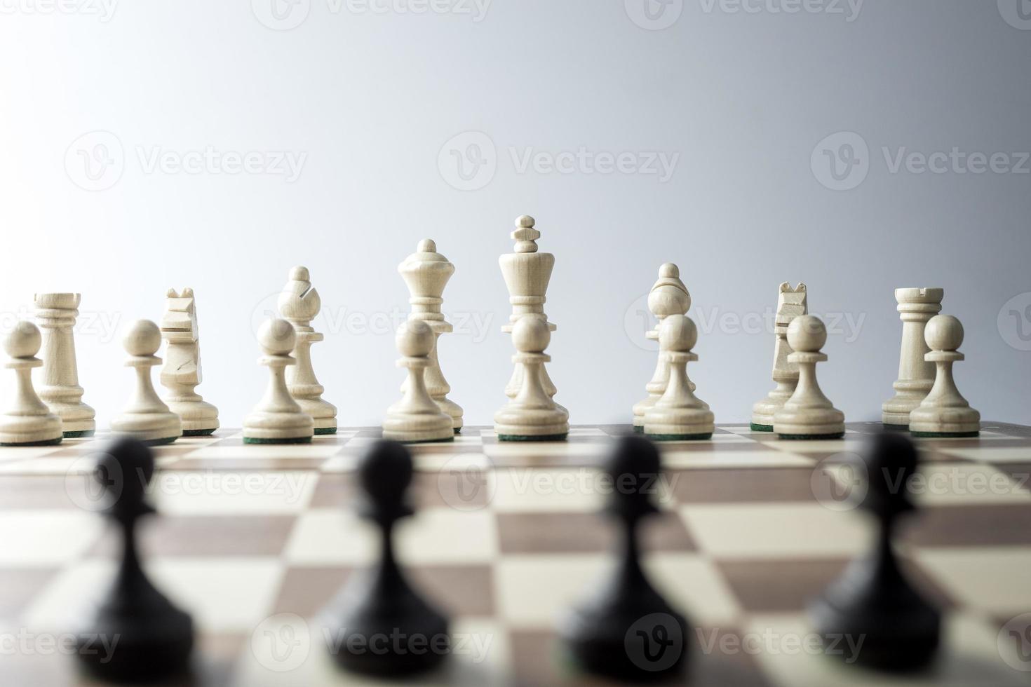figura de ajedrez, estrategia de concepto de negocio, liderazgo, equipo y éxito foto