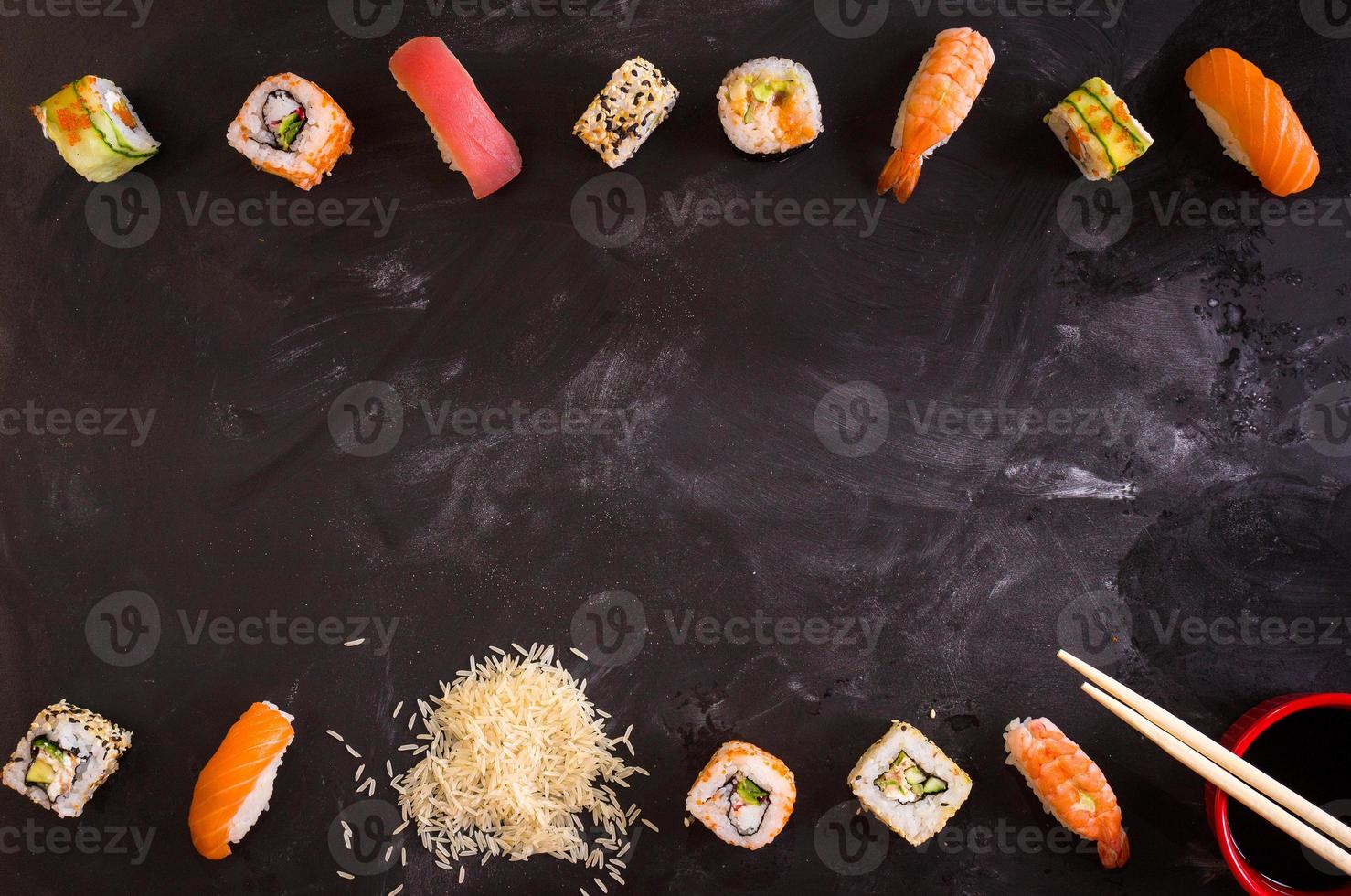 Sushi set on dark background. Minimalism photo