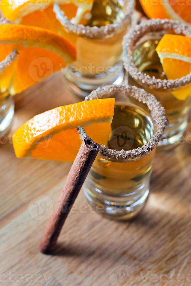 tequila with orange and cinnamon 709463 Stock Photo at Vecteezy