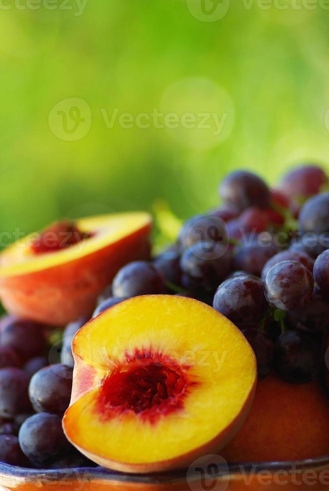 peach, grapes and citrus fruits photo