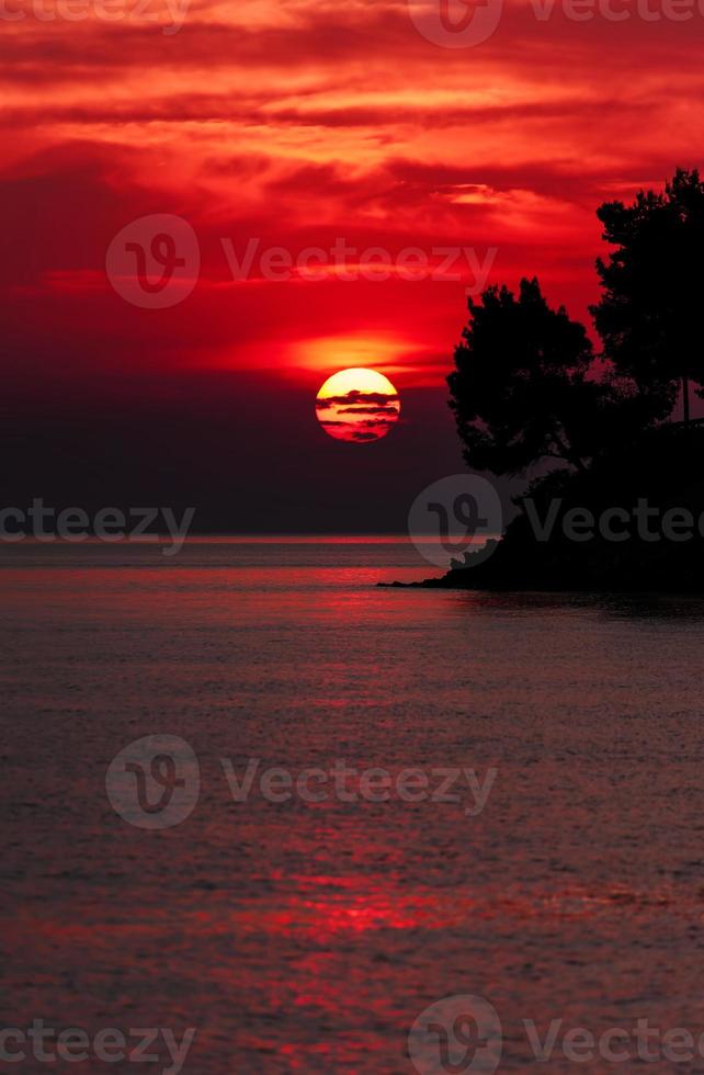 puesta de sol del mar foto