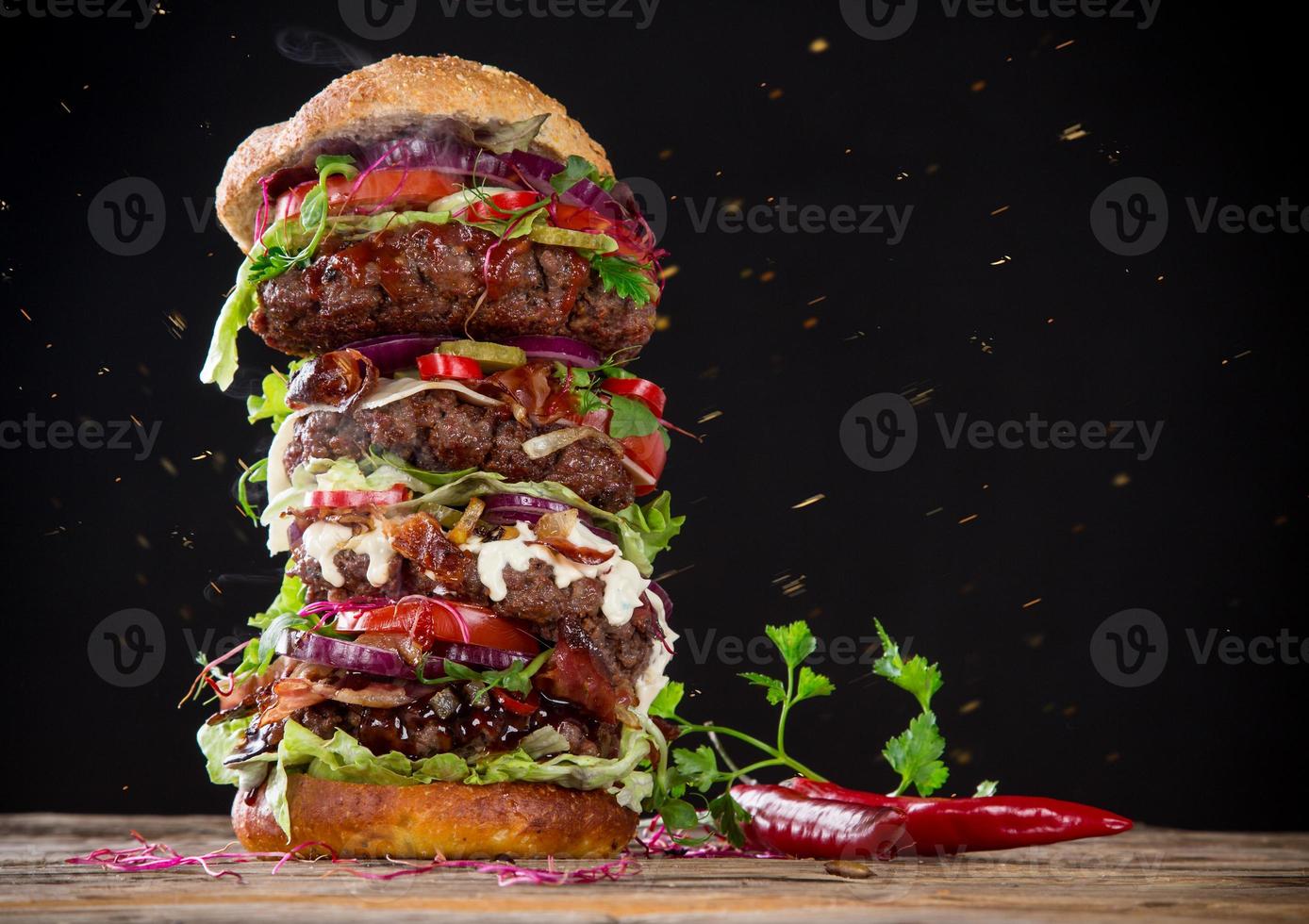 delicious big hamburger on wood photo