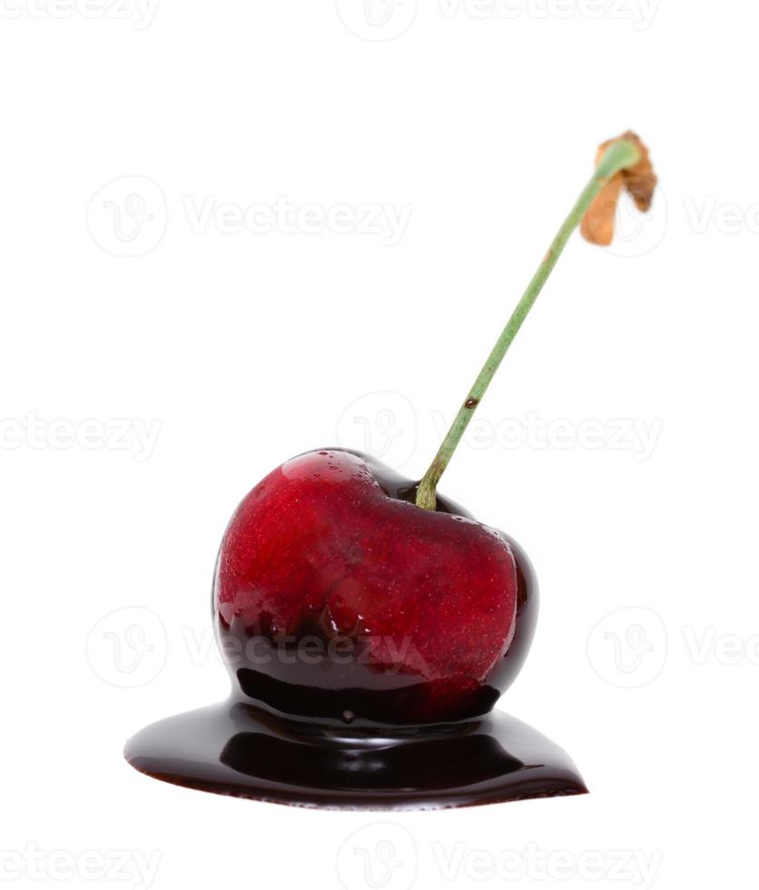 Red cherry in chocolate dipped photo