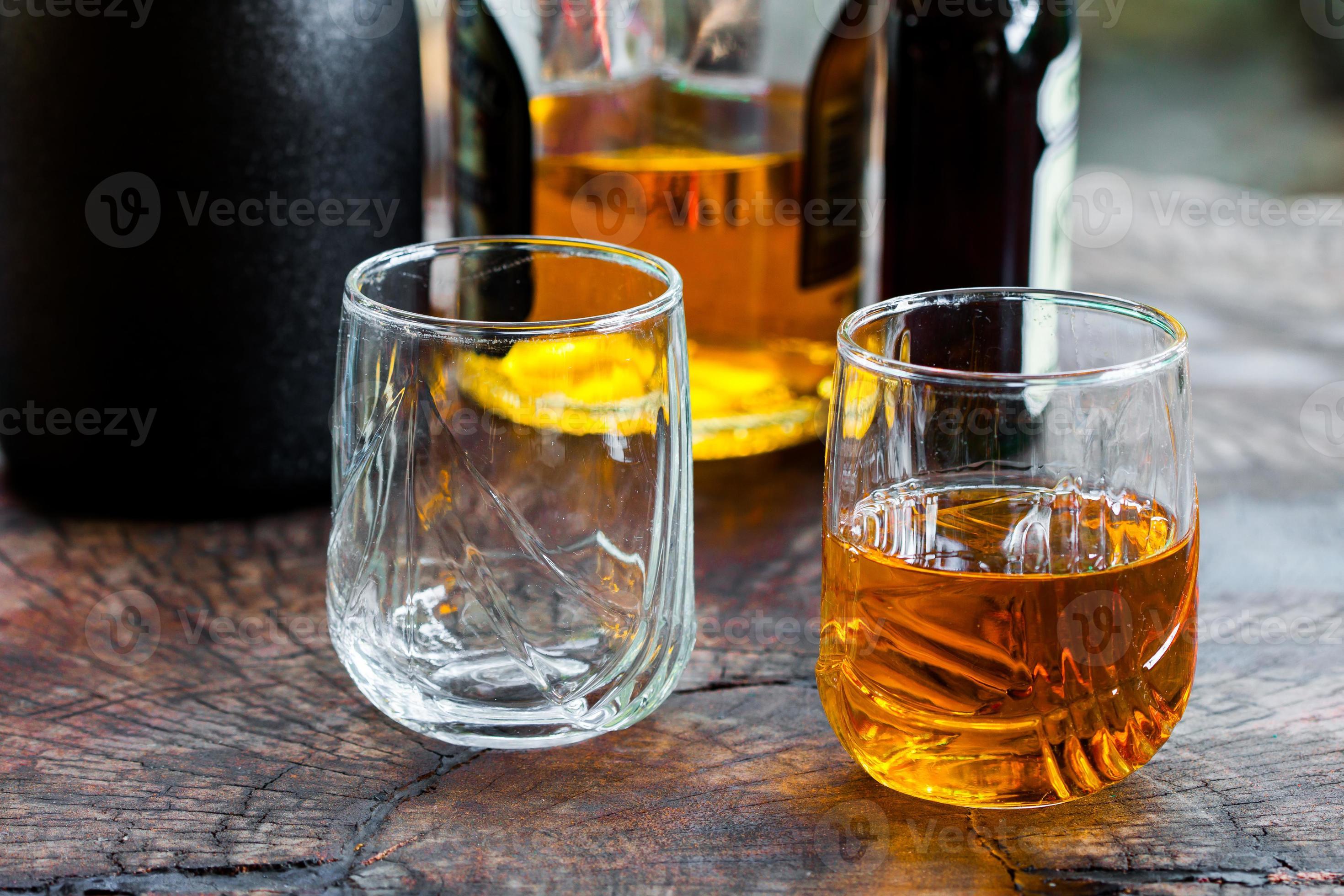 Golden Brown Whisky on the rocks in a glass photo