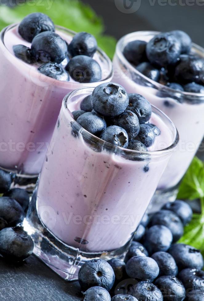 Lilac homemade yogurt with blueberries photo