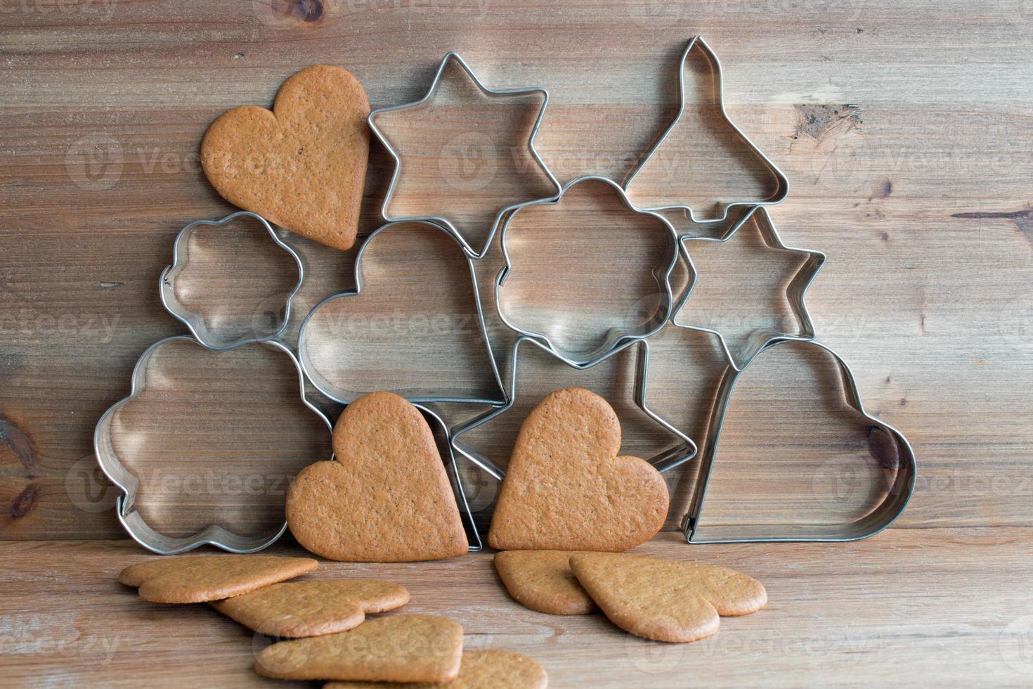 Christmas Cookie Cutters And Gingerbread Cookies Stock Photo