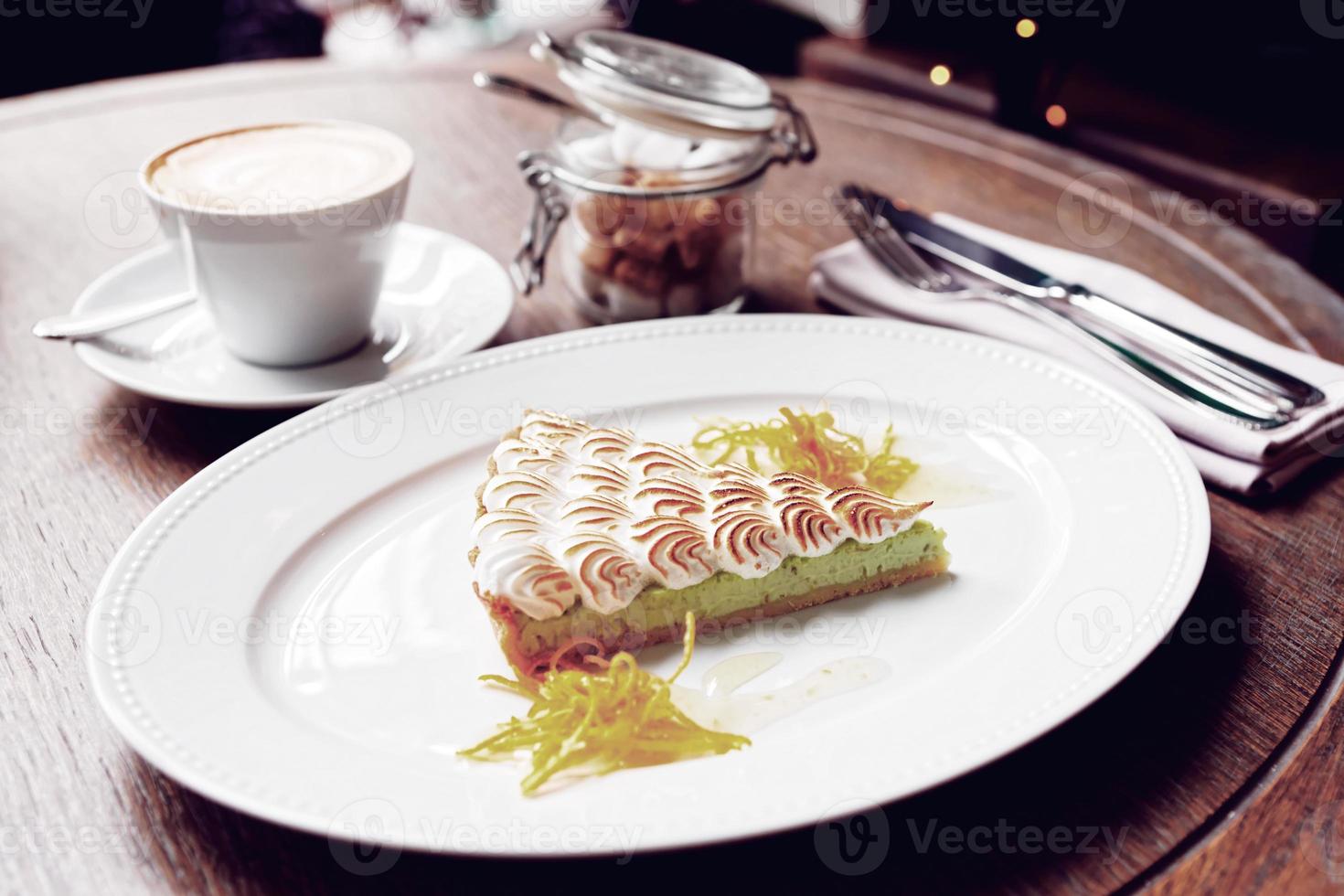 Meringue dessert with coffee, morning meal photo
