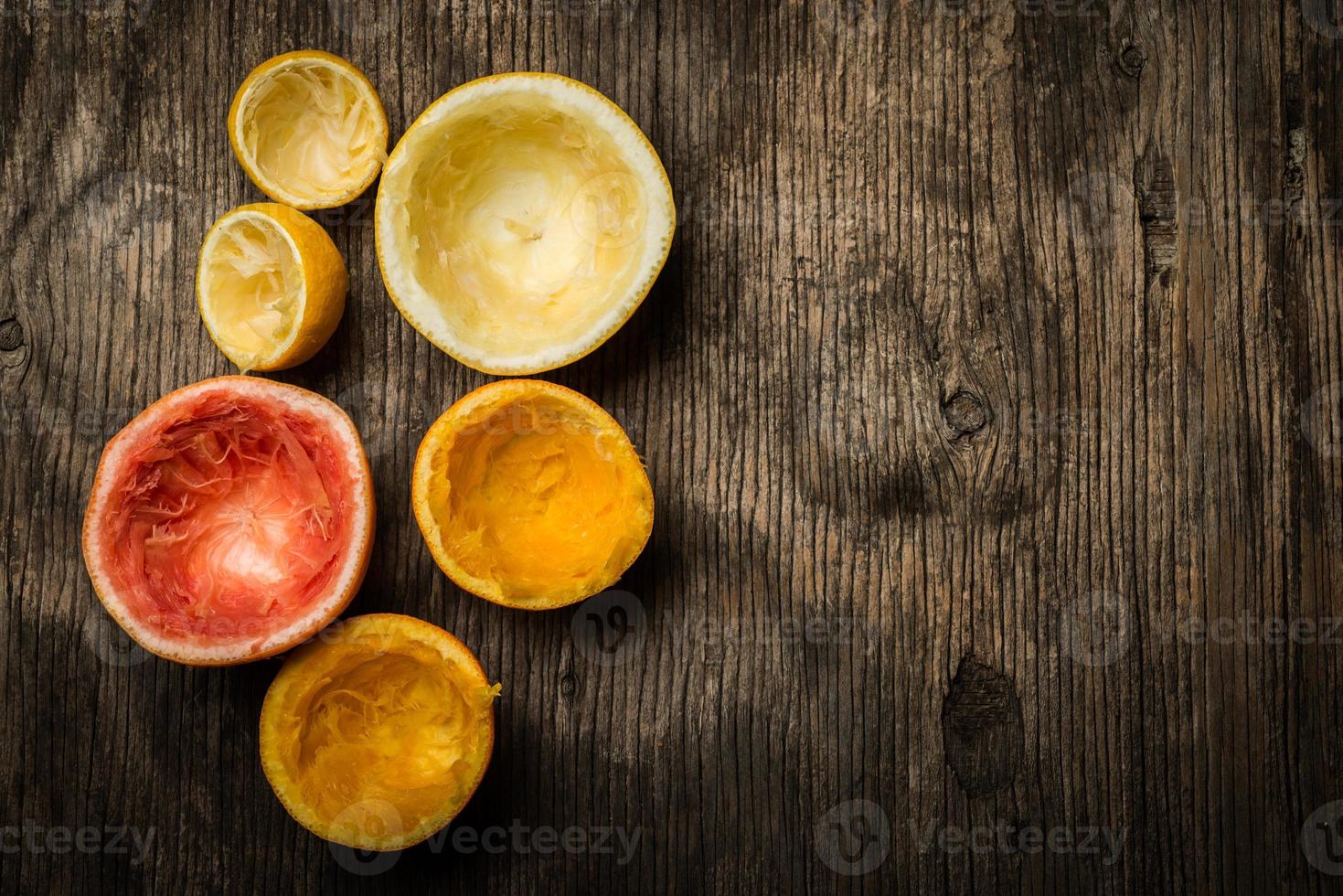 Squeezed citrus fruit, top view photo