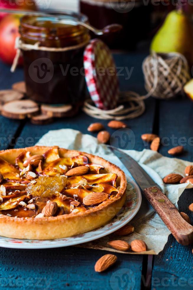 tart with pear jam, apples and caramel photo