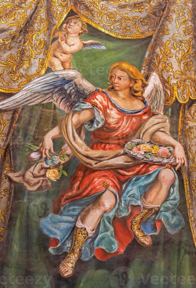 Sevilla - fresco del ángel con las rosas foto