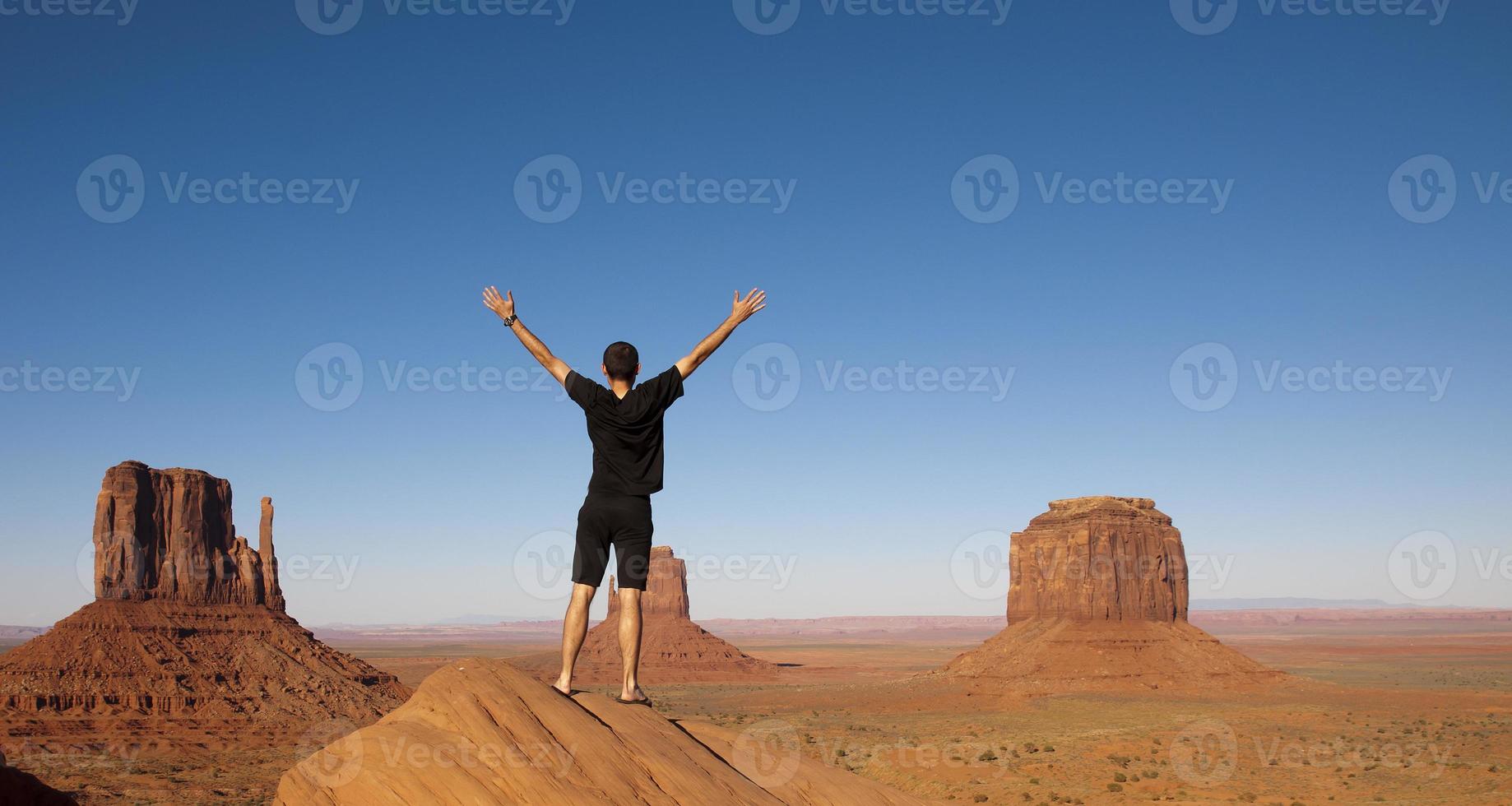 Young man enjoying view of Monument Valley photo