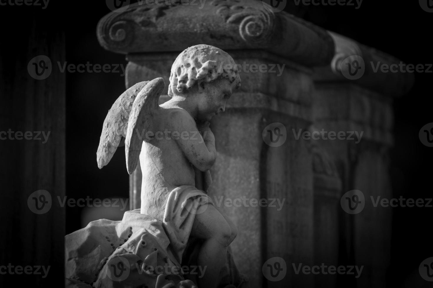Angel Statue on Tombstone photo