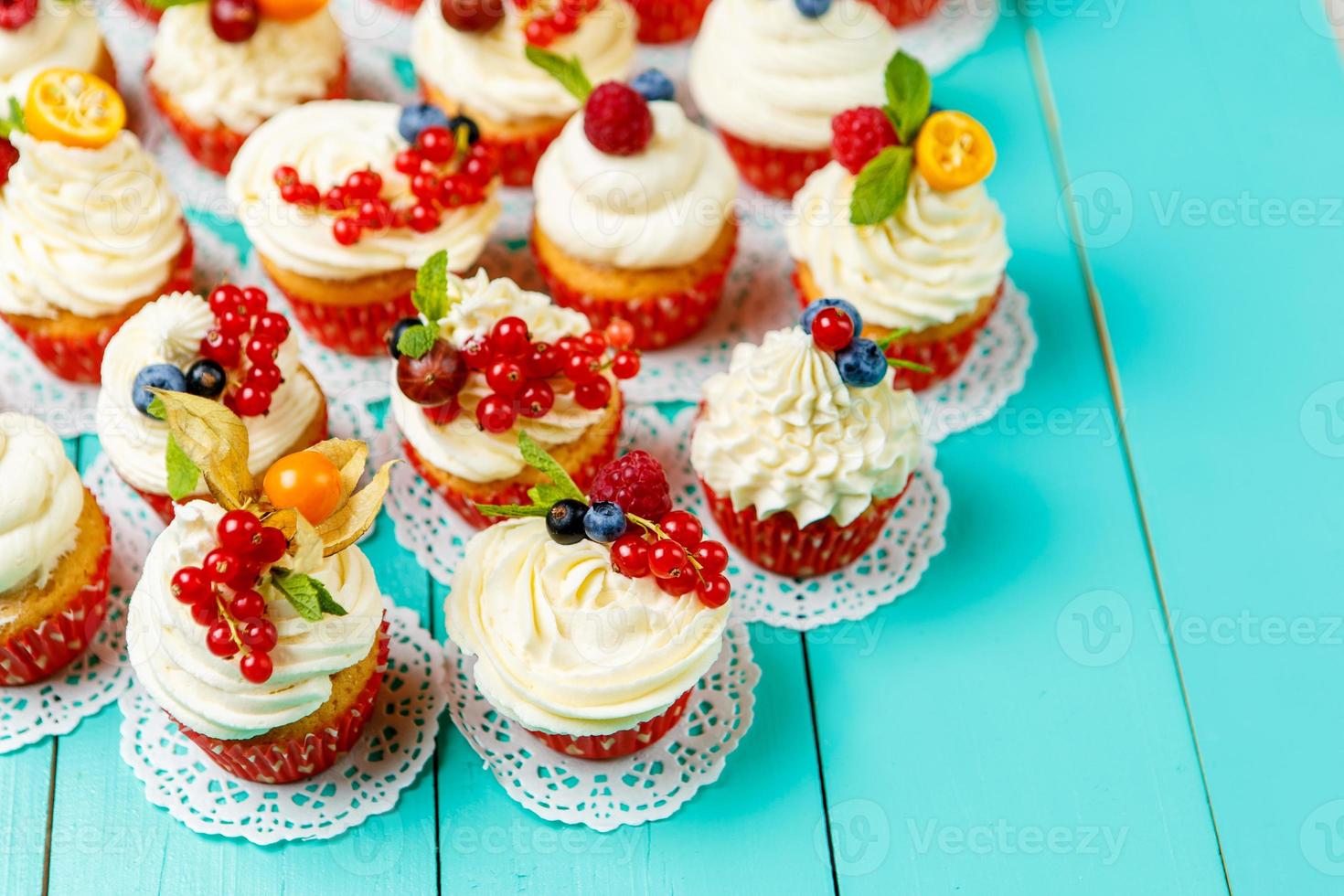 cupcakes with summer berries photo
